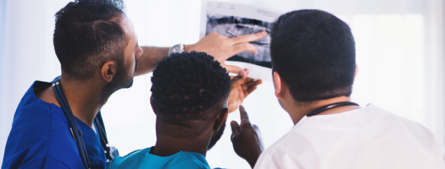 Doctors looking at an xray